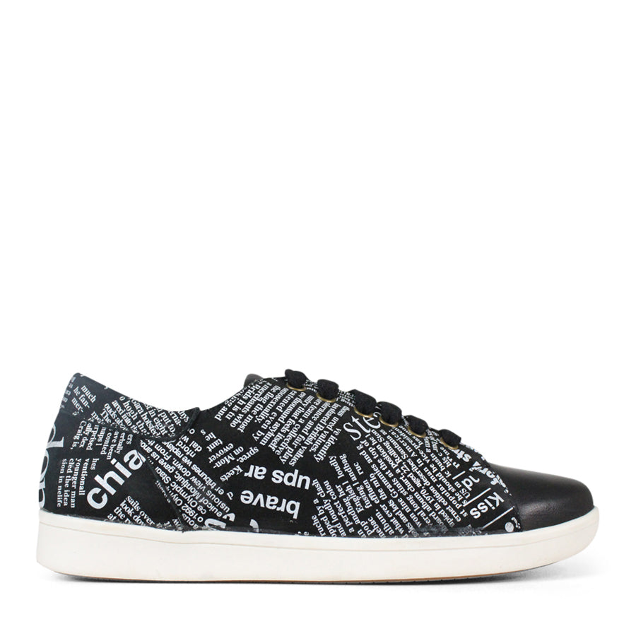  SIDE VIEW OF BLACK NEWSPAPER PRINT LACE UP SNEAKER WITH WHITE SOLE 