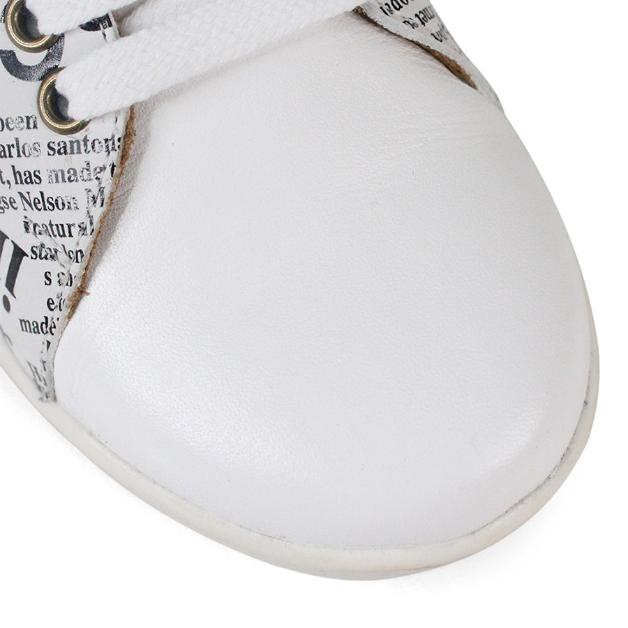 FRONT VIEW OF WHITE NEWSPAPER PRINT LACE UP SNEAKER WITH WHITE SOLE 