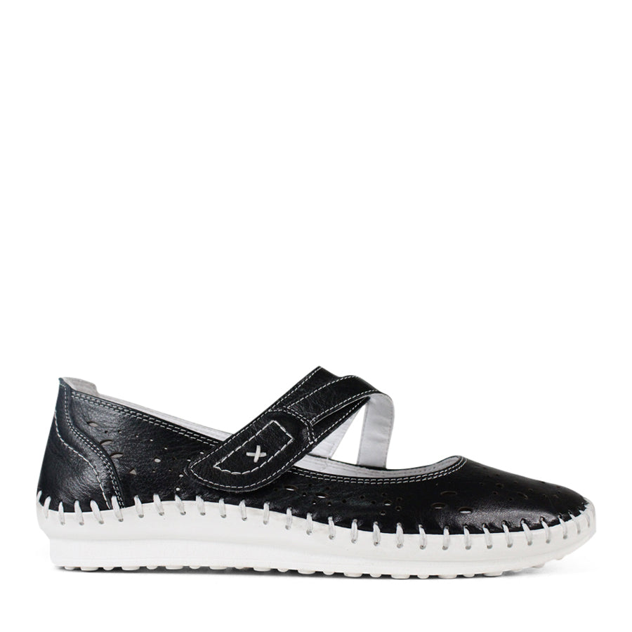 SIDE VIEW BLACK FLAT CASUAL SHOE WITH WHITE STITCHING DETAILING 