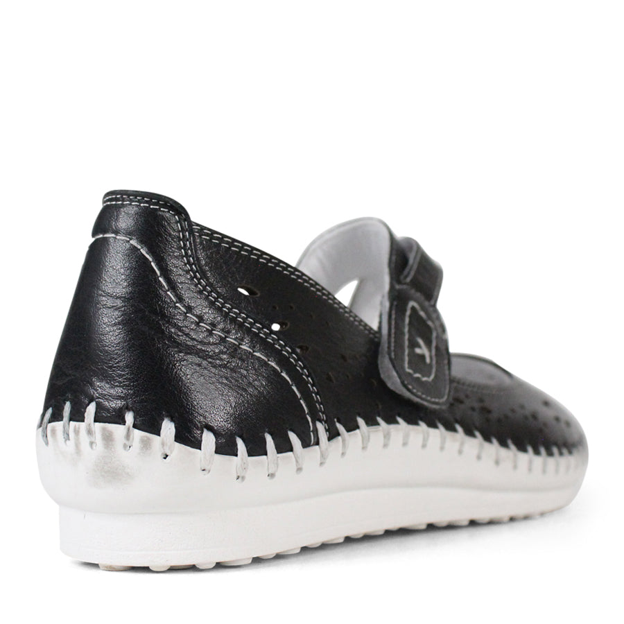 BACK VIEW BLACK FLAT CASUAL SHOE WITH WHITE STITCHING DETAILING 