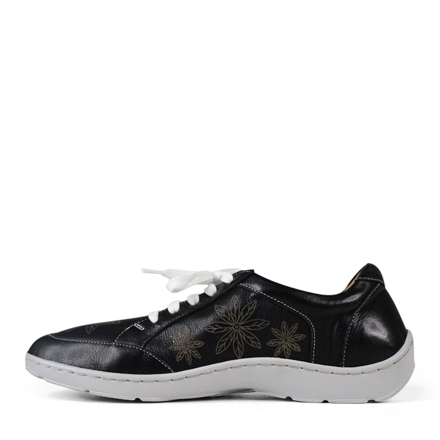  SIDE VIEW OF BLACK LACE UP CASUAL SHOE WITH WHITE SOLE AND WHITE STITCHING. FLOWERS ON THE SIDES AND TOP OF THE SHOE 
