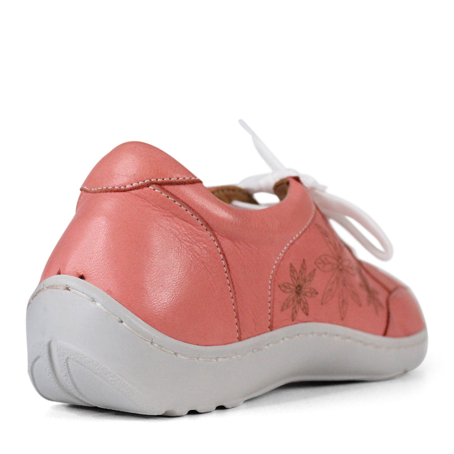 BACK VIEW OF PINK LACE UP CASUAL SHOE WITH WHITE SOLE AND WHITE STITCHING. FLOWERS ON THE SIDES AND TOP OF THE SHOE 