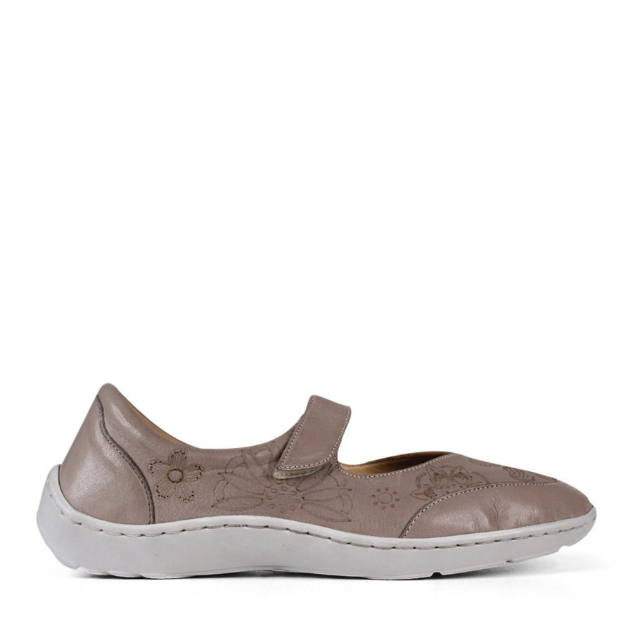 SIDE VIEW OF GREY CASUAL SHOE WITH VELCRO STRAP AND WHITE SOLE. FLOWERS ON THE SIDES AND TOP OF THE SHOE 