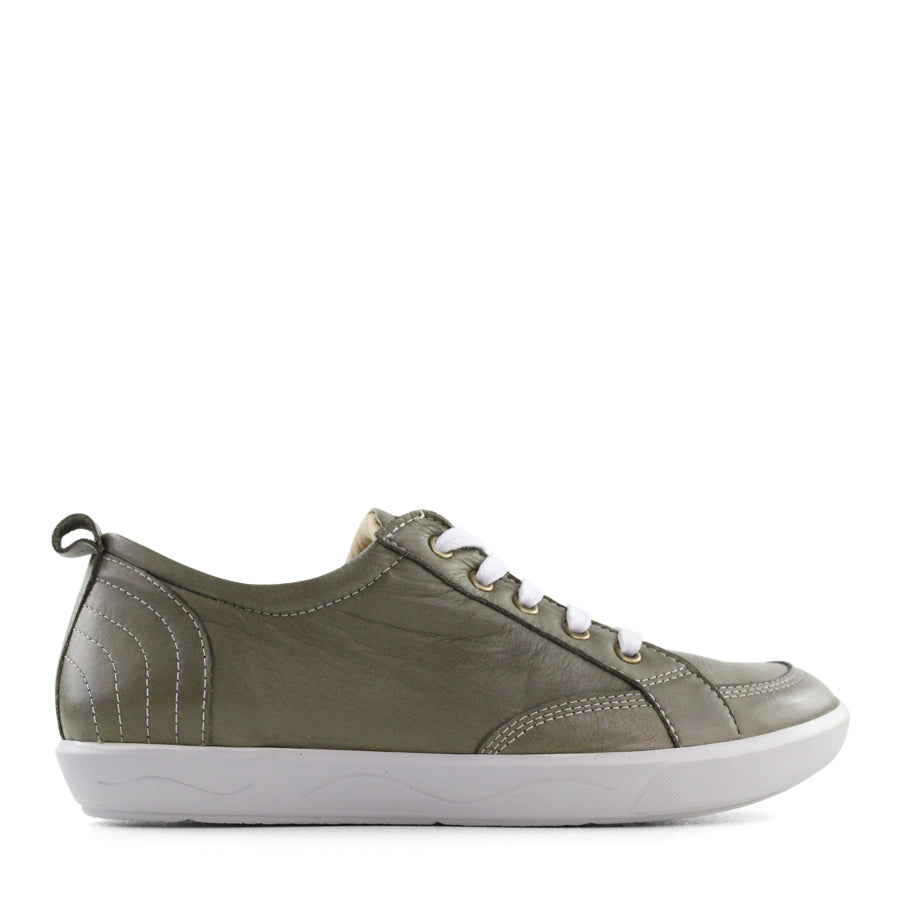 SIDE VIEW OF GREEN LACE UP SNEAKER WITH WHITE STITCHING AND SOLE 