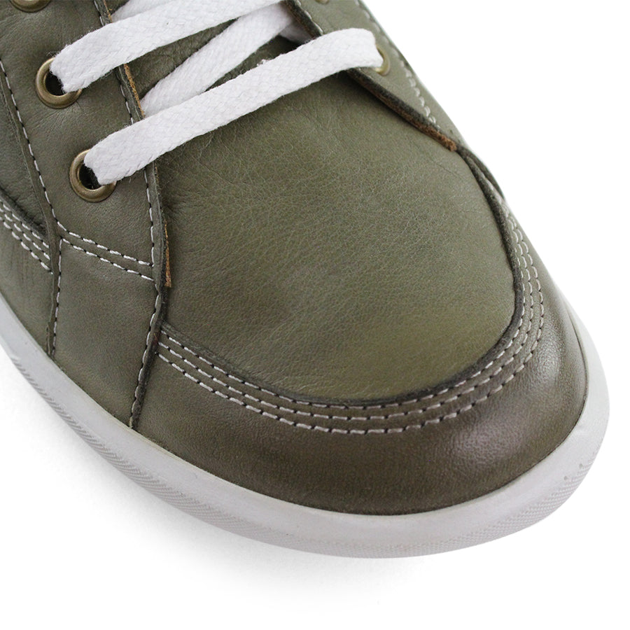 FRONT VIEW OF GREEN LACE UP SNEAKER WITH WHITE STITCHING AND SOLE 
