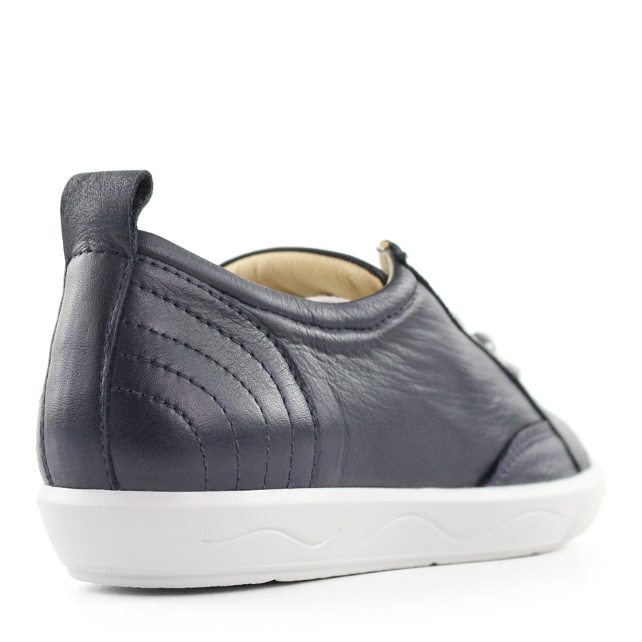 BACK VIEW OF NAVY LACE UP SNEAKER WITH WHITE SOLE