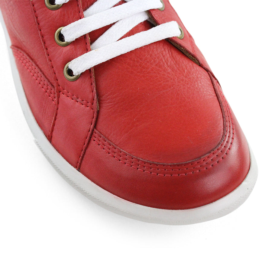 FRONT VIEW OF RED LACE UP SNEAKER WITH WHITE SOLE 