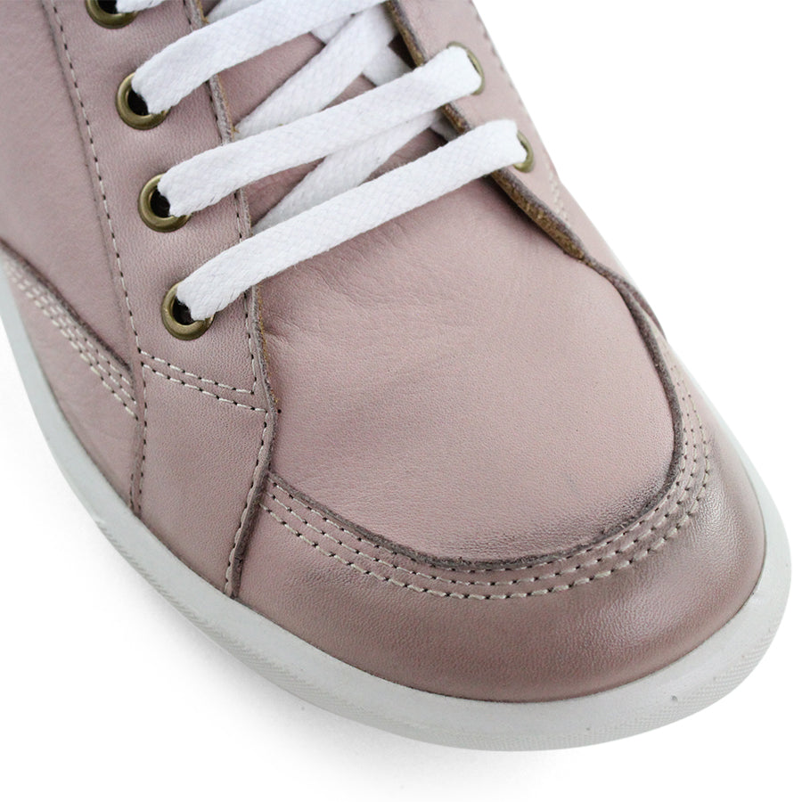 FRONT VIEW OF PINK LACE UP SNEAKER WITH LIGHT STITCHING AND SOLE 