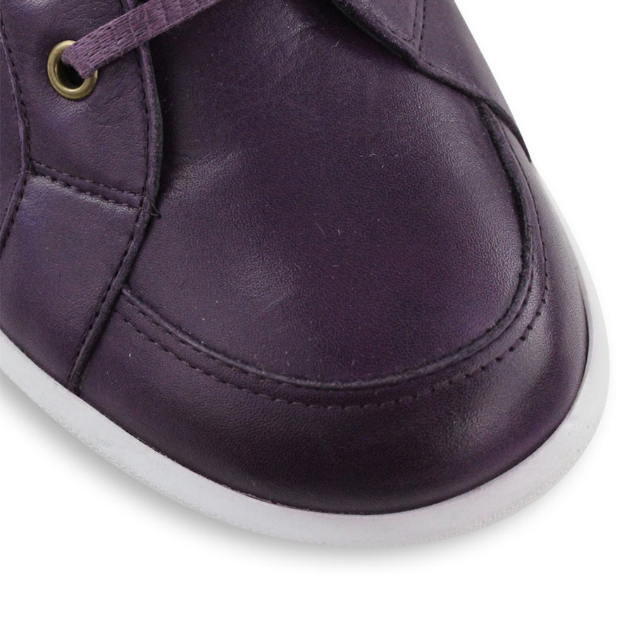 FRONT VIEW OF PURPLE LACE UP ANKLE BOOT WITH WHITE SOLE 