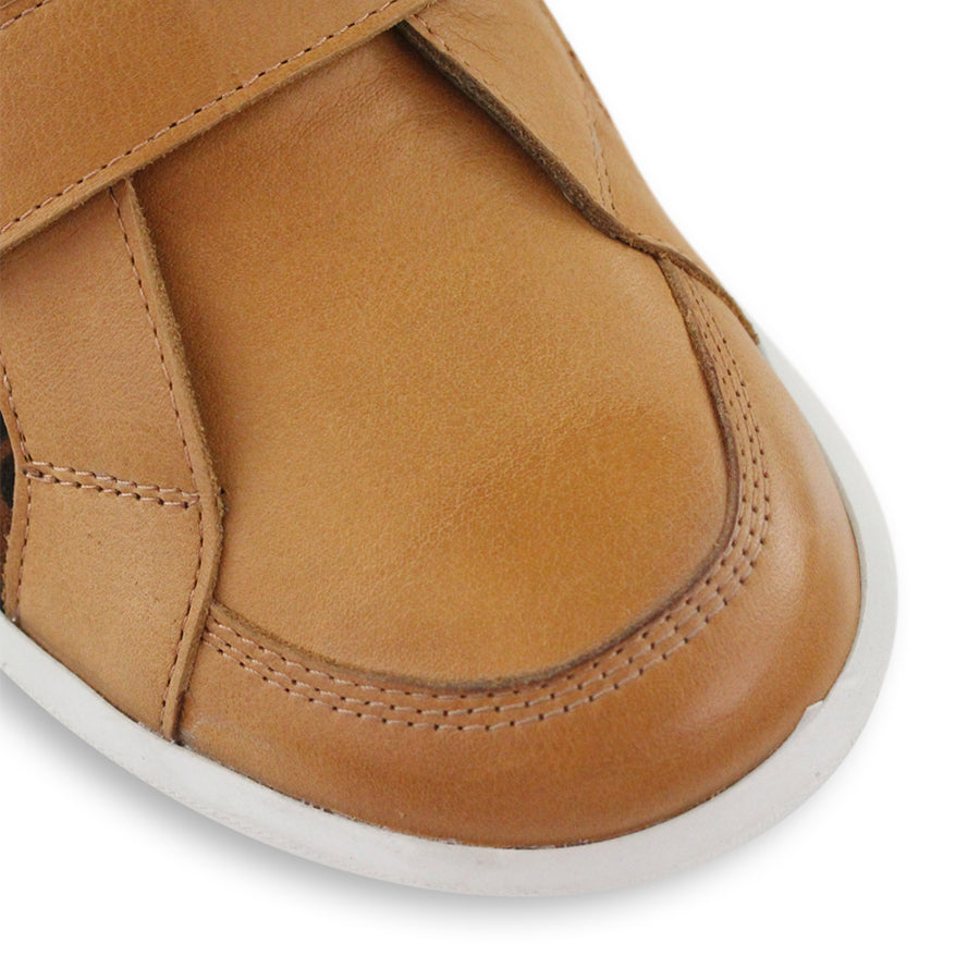 FRONT VIEW OF TAN CASUAL SHOE WITH TWO VELCRO STRAPS AND LEOPARD PRINT PANELLING