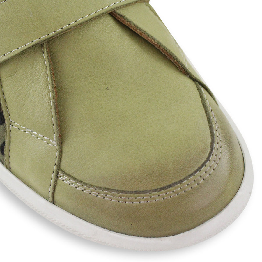 FRONT VIEW OF GREEN CASUAL SHOE WITH TWO VELCRO STRAPS AND LEOPARD PRINT PANELLING