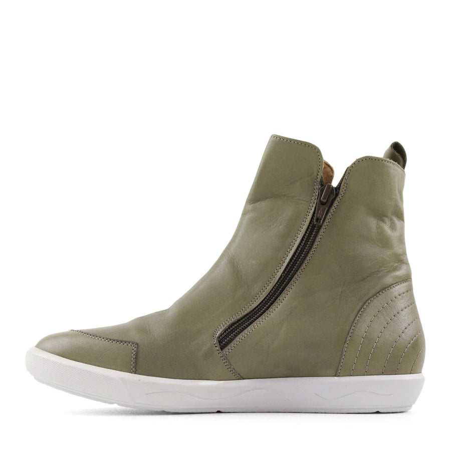 SIDE VIEW OF GREEN ZIP UP ANKLE BOOT WITH WHITE SOLE 