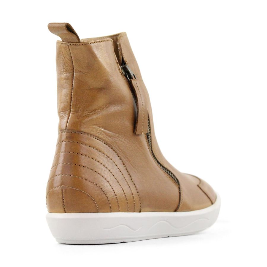 BACK VIEW OF TAN ZIP UP ANKLE BOOT WITH WHITE SOLE 
