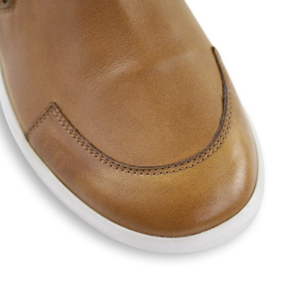 FRONT VIEW OF TAN ZIP UP ANKLE BOOT WITH WHITE SOLE 
