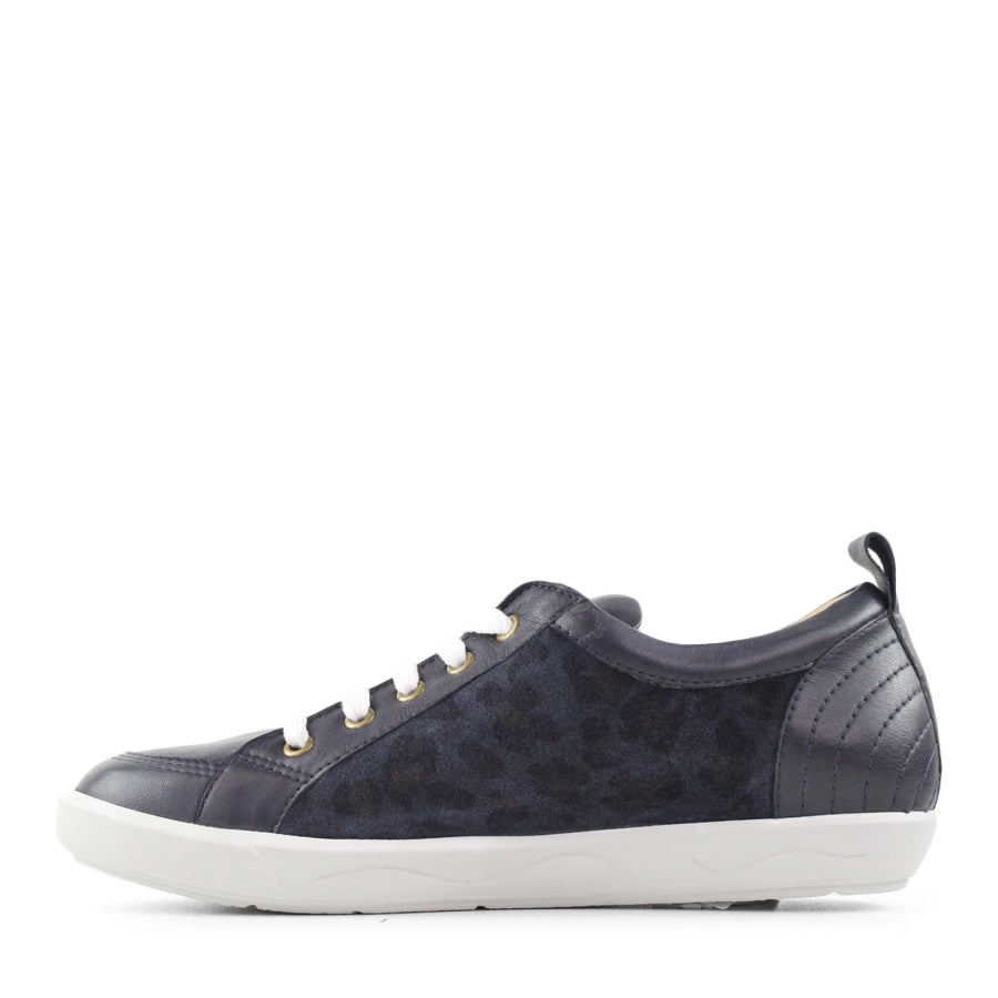 SIDE VIEW OF BLUE LACE UP SNEAKER WITH LEOPARD PRINT PANELS ON THE SIDES 