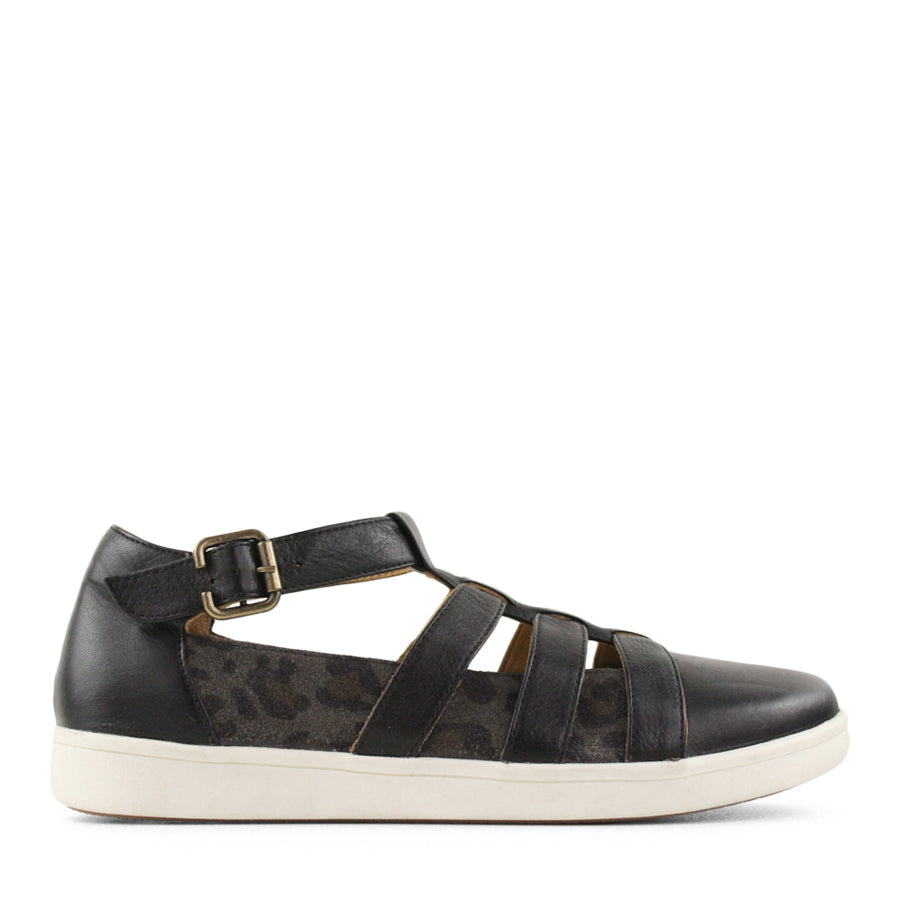SIDE VIEW OF BLACK T BAR SANDAL WITH CUT OUT DETAILING, BUCKLE AND LEOPARD PRINT PANELS  