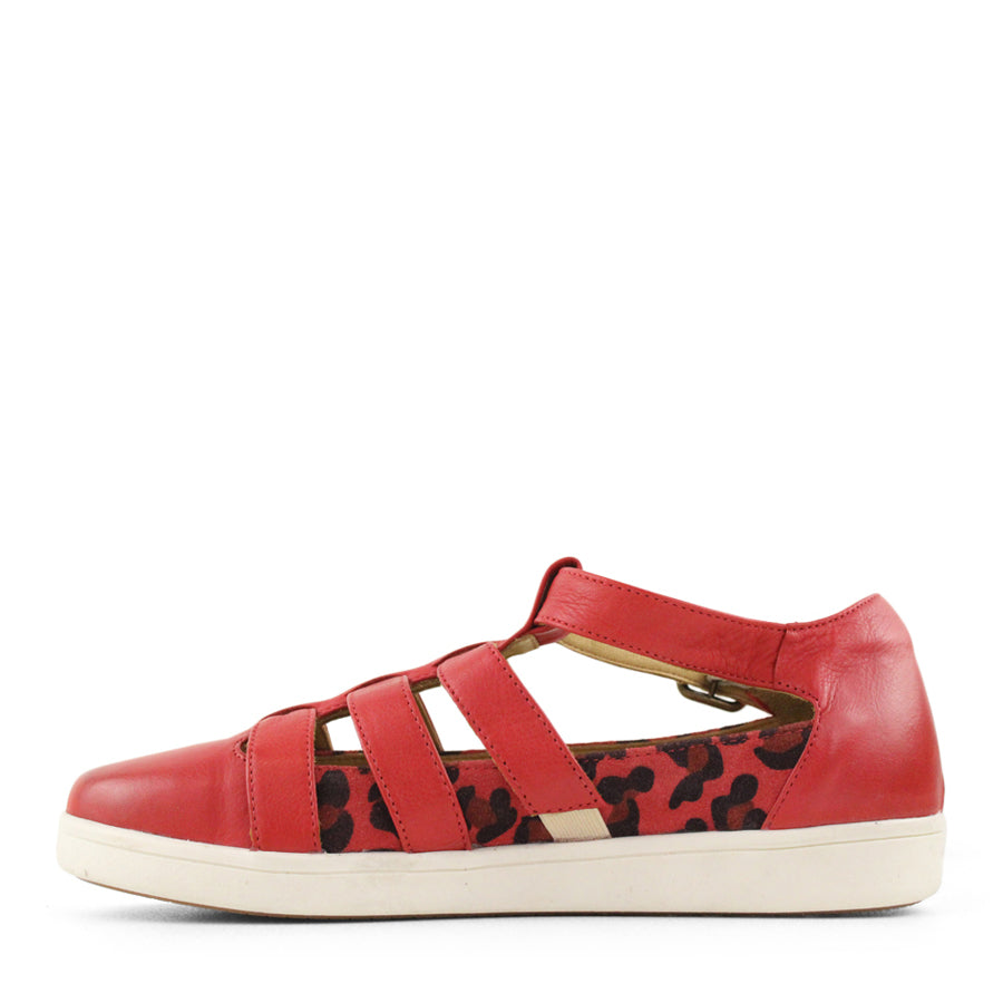 SIDE VIEW OF RED T BAR SANDAL WITH CUT OUT DETAILING, BUCKLE AND LEOPARD PRINT PANELS  