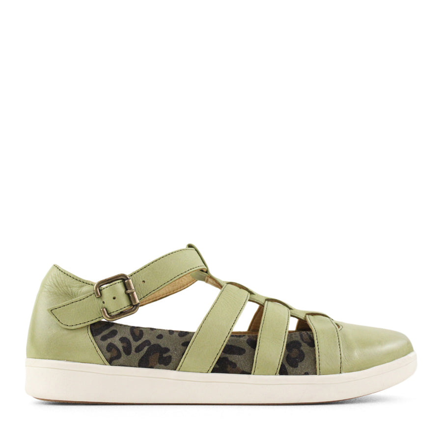 SIDE VIEW OF GREEN T BAR SANDAL WITH CUT OUT DETAILING, BUCKLE AND LEOPARD PRINT PANELS  