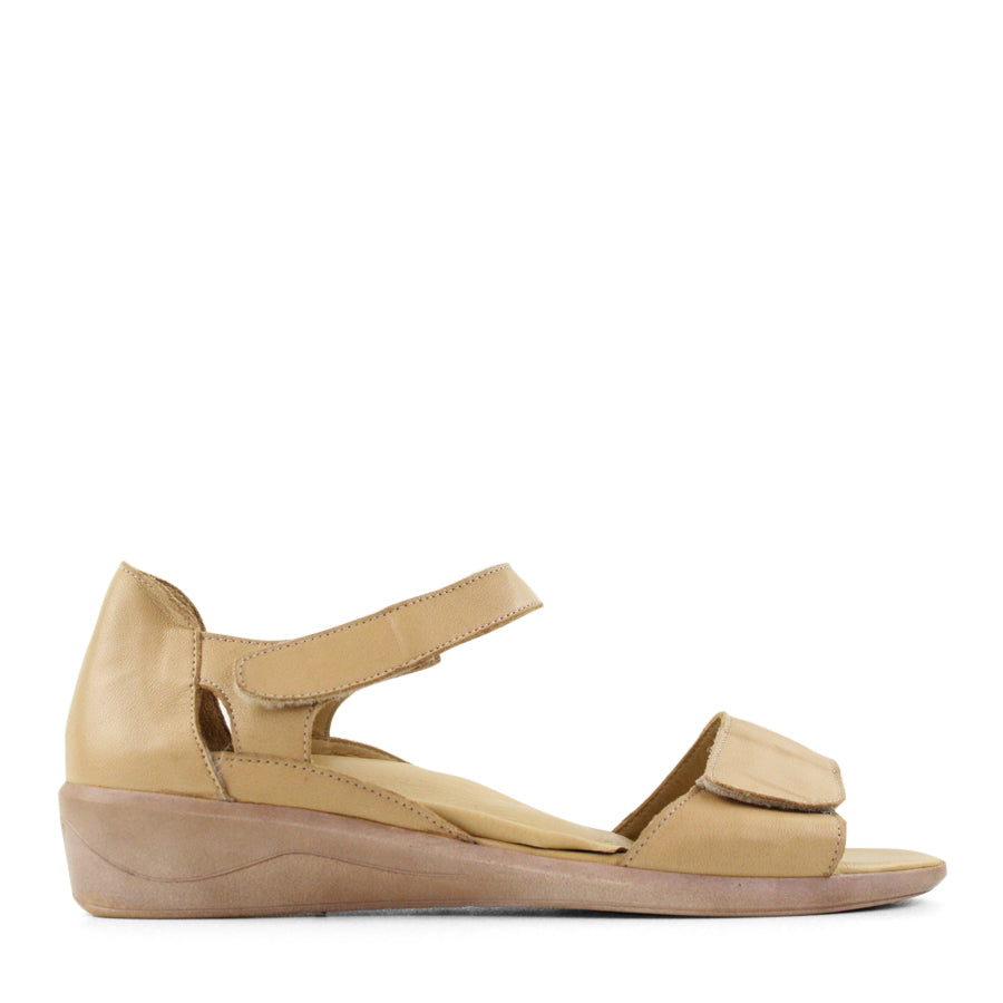 SIDE VIEW OF YELLOW SANDAL WITH VELCRO STRAP AND SMALL HEEL 