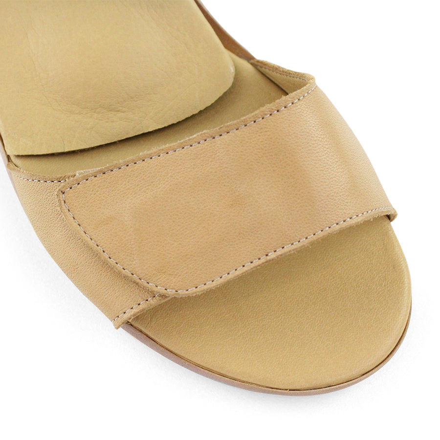 FRONT VIEW OF YELLOW SANDAL WITH VELCRO STRAP AND SMALL HEEL 