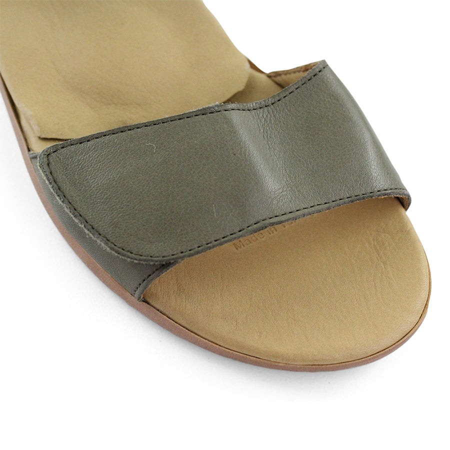 FRONT VIEW OF GREEN SANDAL WITH VELCRO STRAP AND SMALL HEEL 