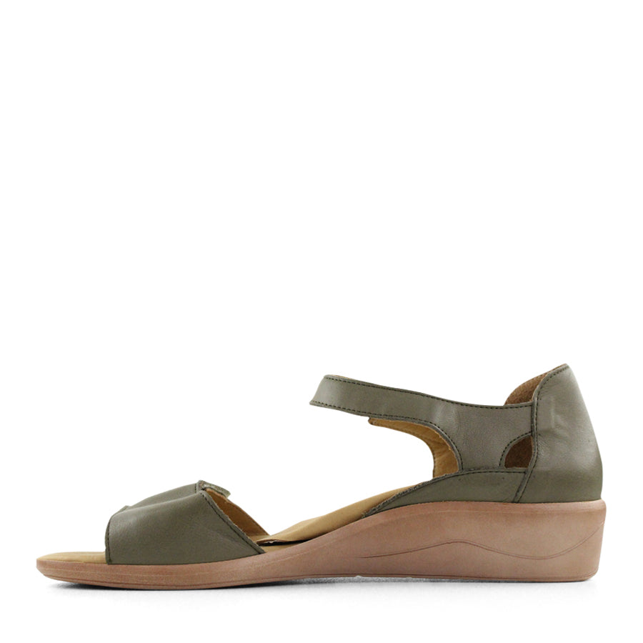SIDE VIEW OF GREEN SANDAL WITH VELCRO STRAP AND SMALL HEEL 