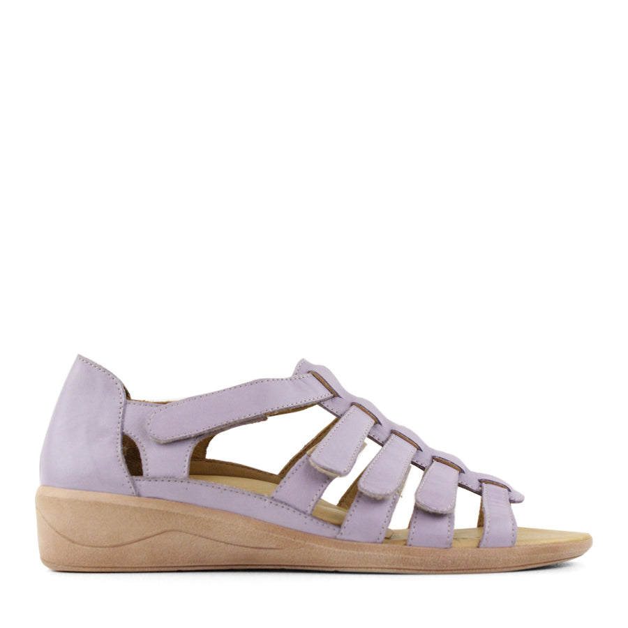 SIDE VIEW OF LILAC T BAR SANDAL WITH VELCRO STRAP AND SMALL HEEL 