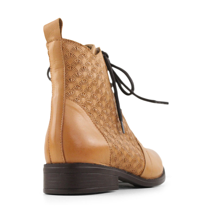 BACK VIEW OF TAN ANKLE LACE UP BOOT WITH PATTERNED LEATHER DETAILS 