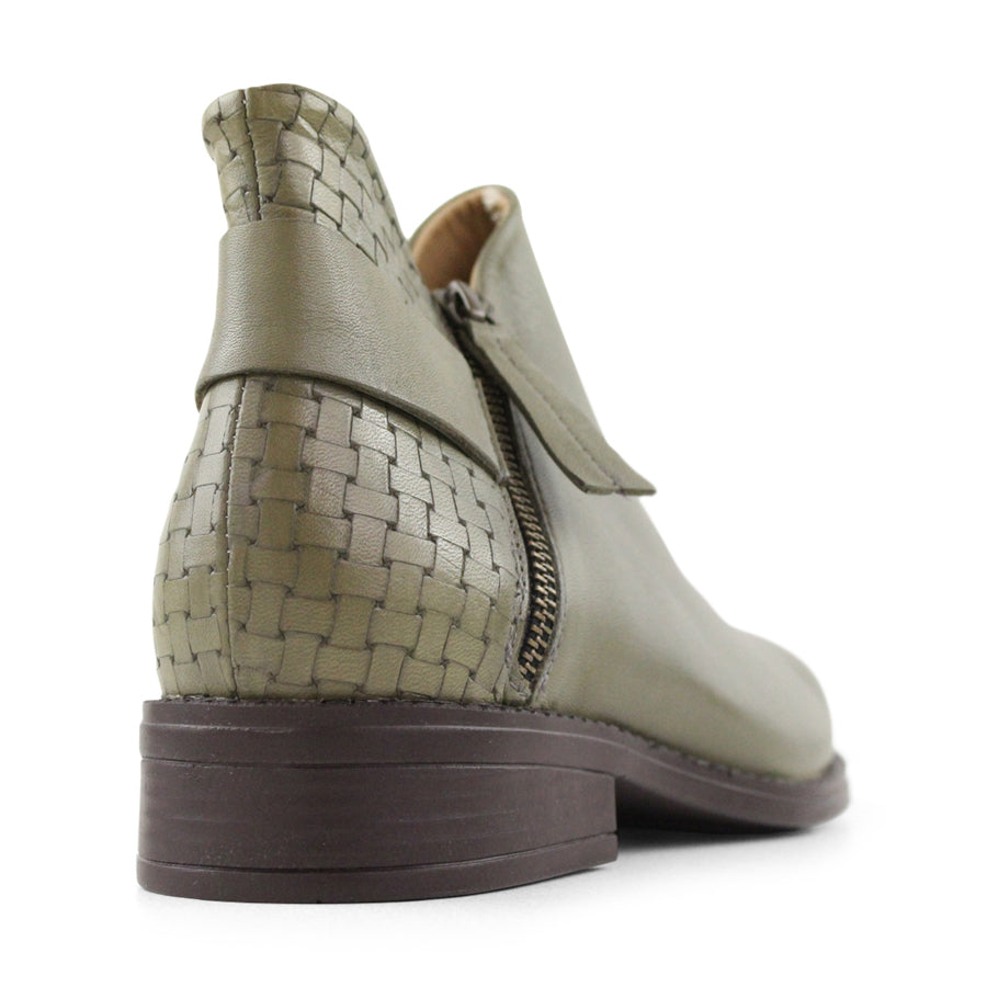 Behind view, Green, Zip up, Rubber sole, leather strap on rear, roll weighted pattern on rear, 3cm block heel height