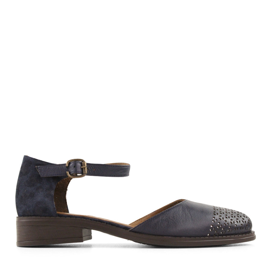 SIDE VIEW NAVY MARY JANE STYLE FLAT WITH LEOPARD PRINT AND CUTOUT DETAILING