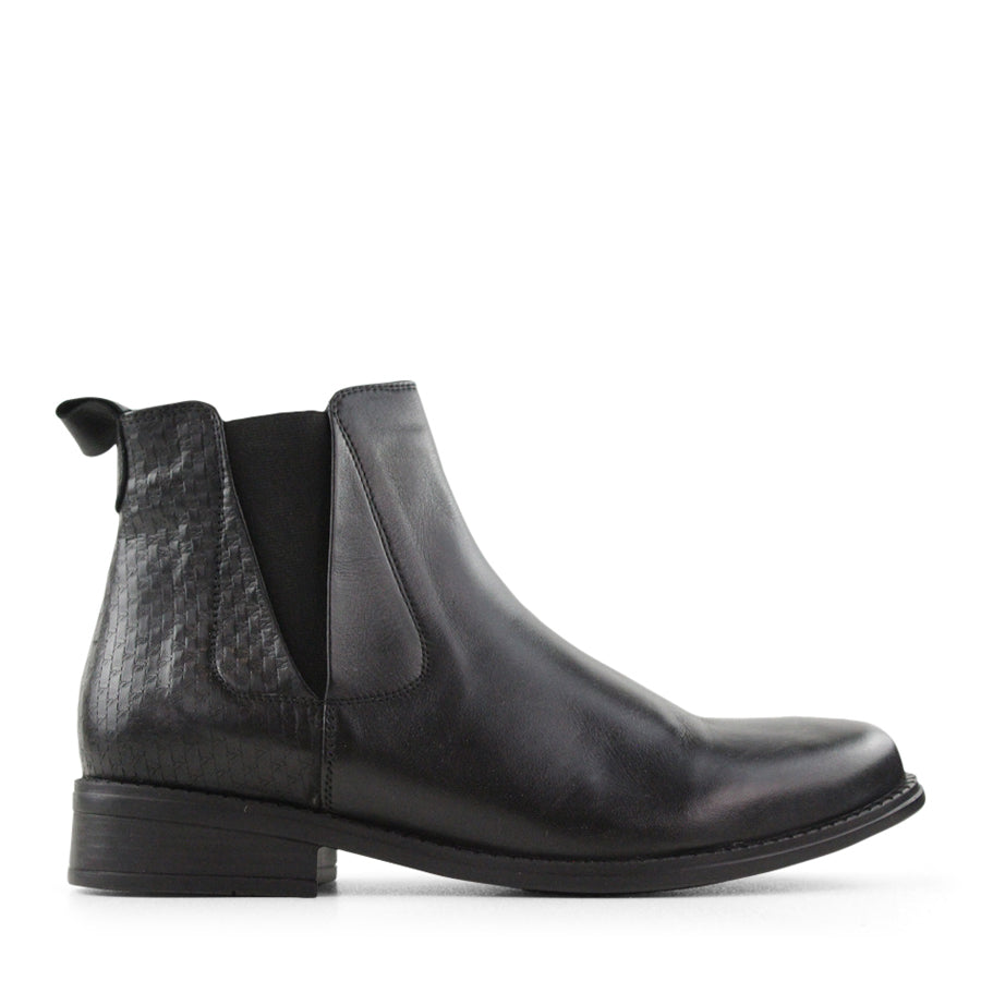 SIDE VIEW OF BLACK LEATHER ANKLE BOOT WITH SMALL HEEL