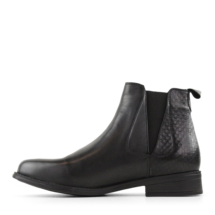 SIDE VIEW OF BLACK LEATHER ANKLE BOOT WITH SMALL HEEL