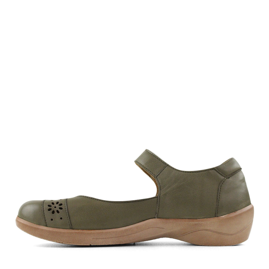 SIDE VIEW OF GREEN MARY JANE STYLE CASUAL SHOE WITH FLOWER CUT OUT DETAILLING ON THE TOP OF THE CLOSED TOE