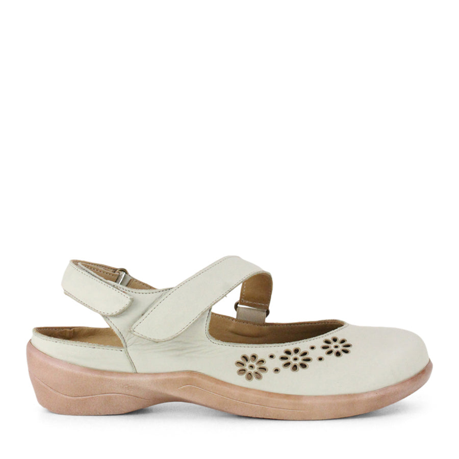 SIDE VIEW OF LIGHT GREEN OPEN HEEL Y BACK SANDAL WITH FLOWER CUT OUT DETAIL ON THE CLOSED TOE 