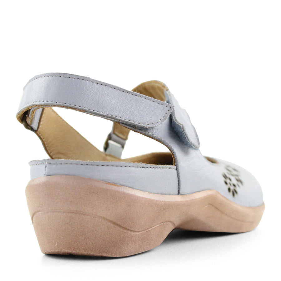 BACK VIEW OF LIGHT BLUE OPEN HEEL Y BACK SANDAL WITH FLOWER CUT OUT DETAIL ON THE CLOSED TOE 