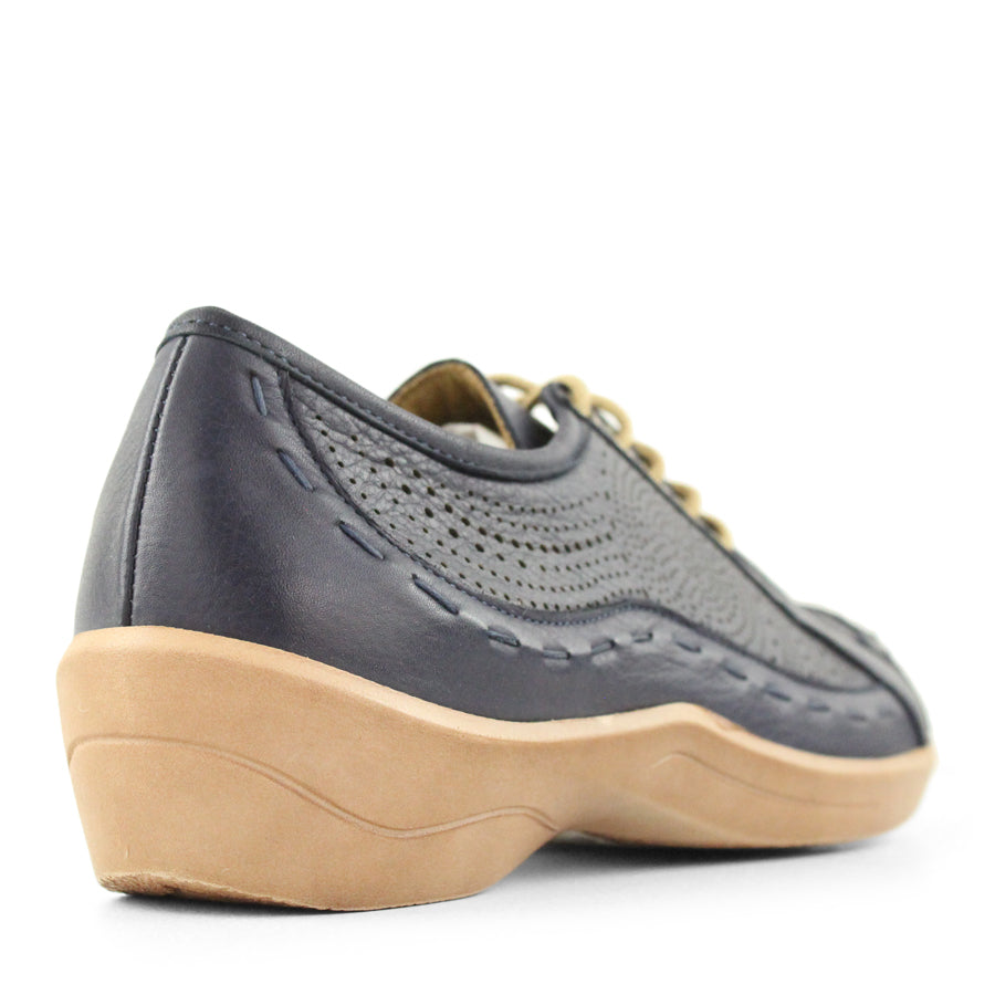 BACK VIEW OF NAVY LACE UP CASUAL SHOE WITH LASER CUT DETAIL 