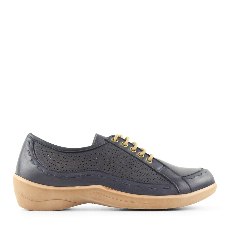 SIDE VIEW OF NAVY LACE UP CASUAL SHOE WITH LASER CUT DETAIL 