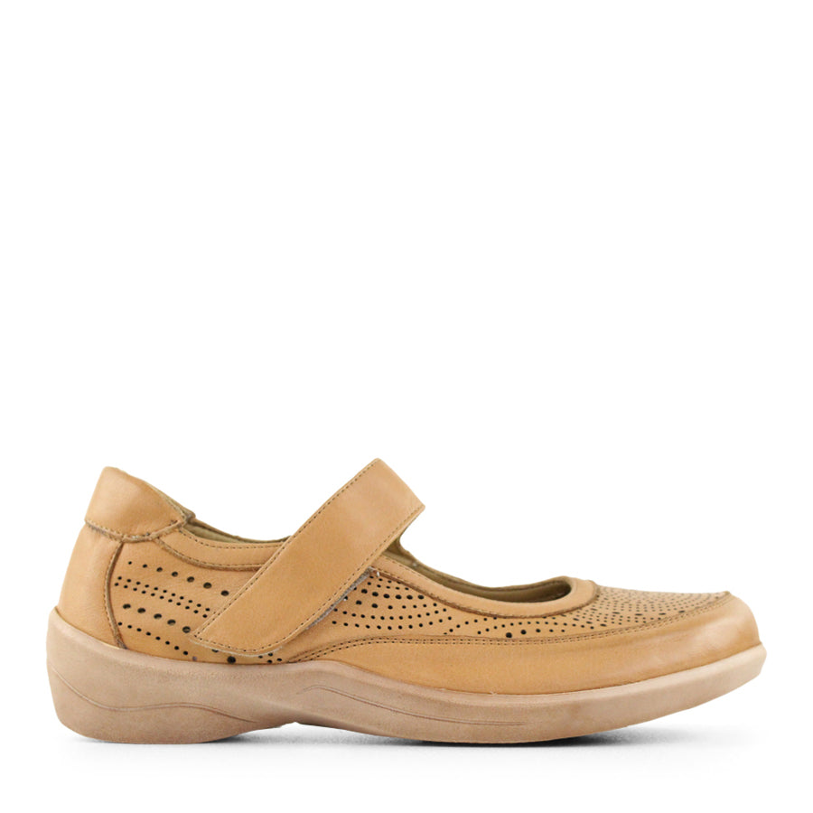 SIDE VIEW OF TAN CASUAL SHOE WITH VELCRO STRAP AND LASER CUT DETAILING