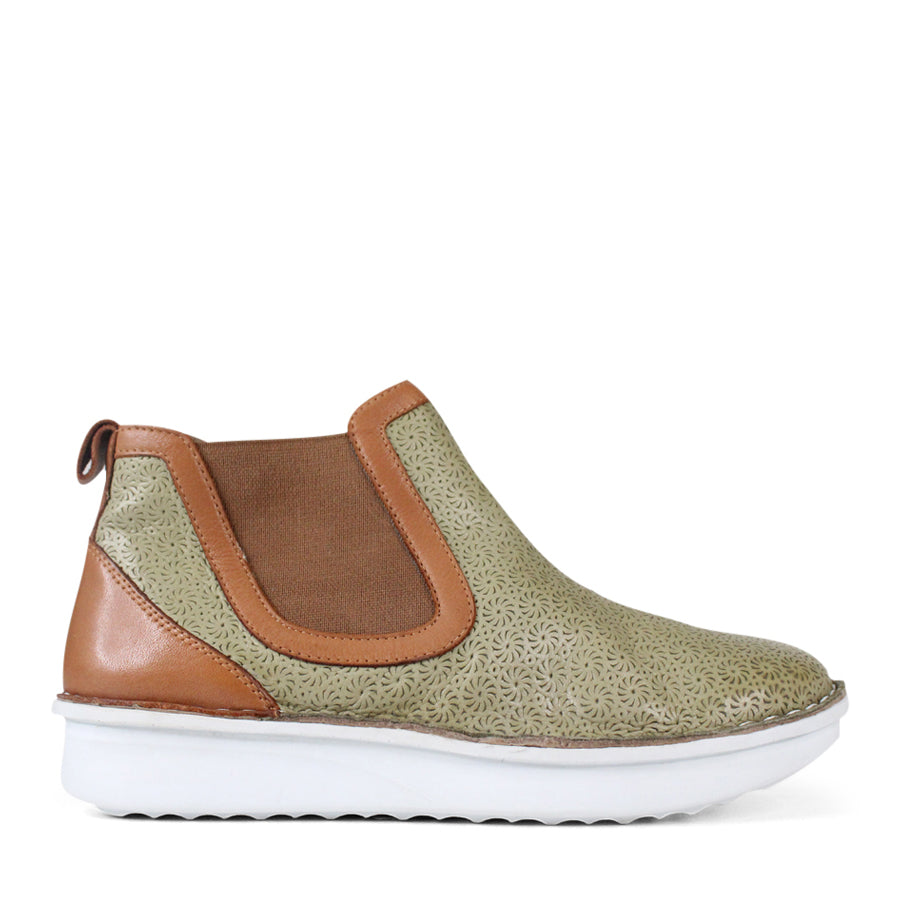 SIDE VIEW OF PATTERNED RED ANKLE BOOT WITH TAN PANELS AND WHITE SOLE 