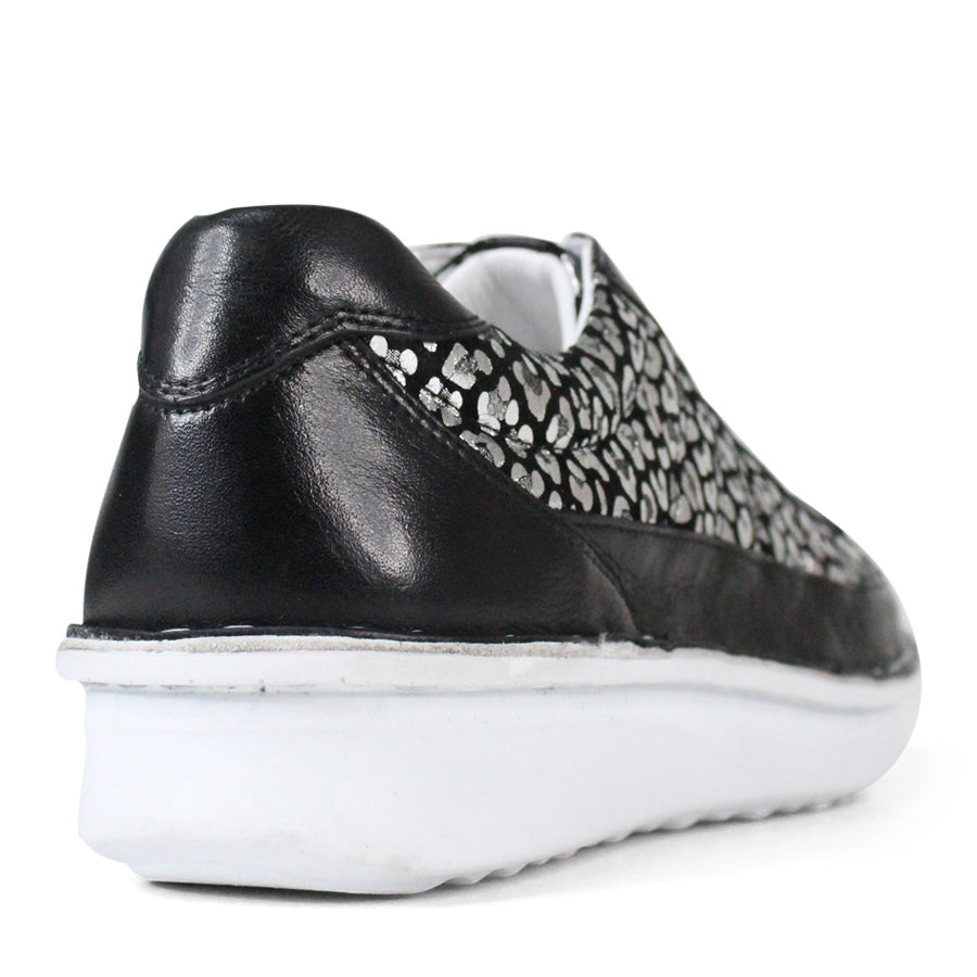 BACK VIEW OF BLACK LACE UP SNEAKER WITH METALLIC LEOPARD PRINT DETAILING ON SIDE AND FRONT PANELS. WHITE SOLE 
