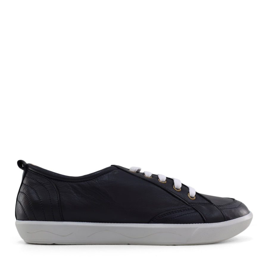 SIDE VIEW OF NAVY LACE UP SNEAKER WITH WHITE SOLE 