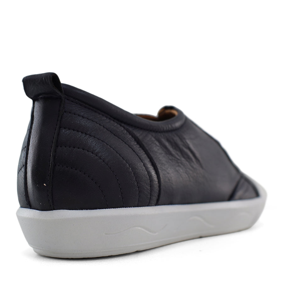 BACK VIEW OF NAVY LACE UP SNEAKER WITH WHITE SOLE 