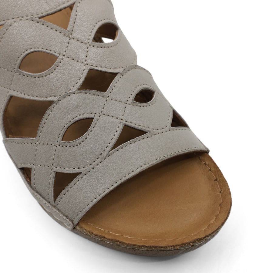 FRONT VIEW OF GREY WEDGES WITH OPEN TOE AND WEAVE DETAIL