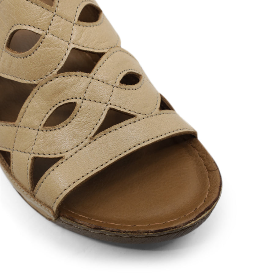 FRONT VIEW OF BEIGE WEDGES WITH OPEN TOE AND WEAVE DETAIL
