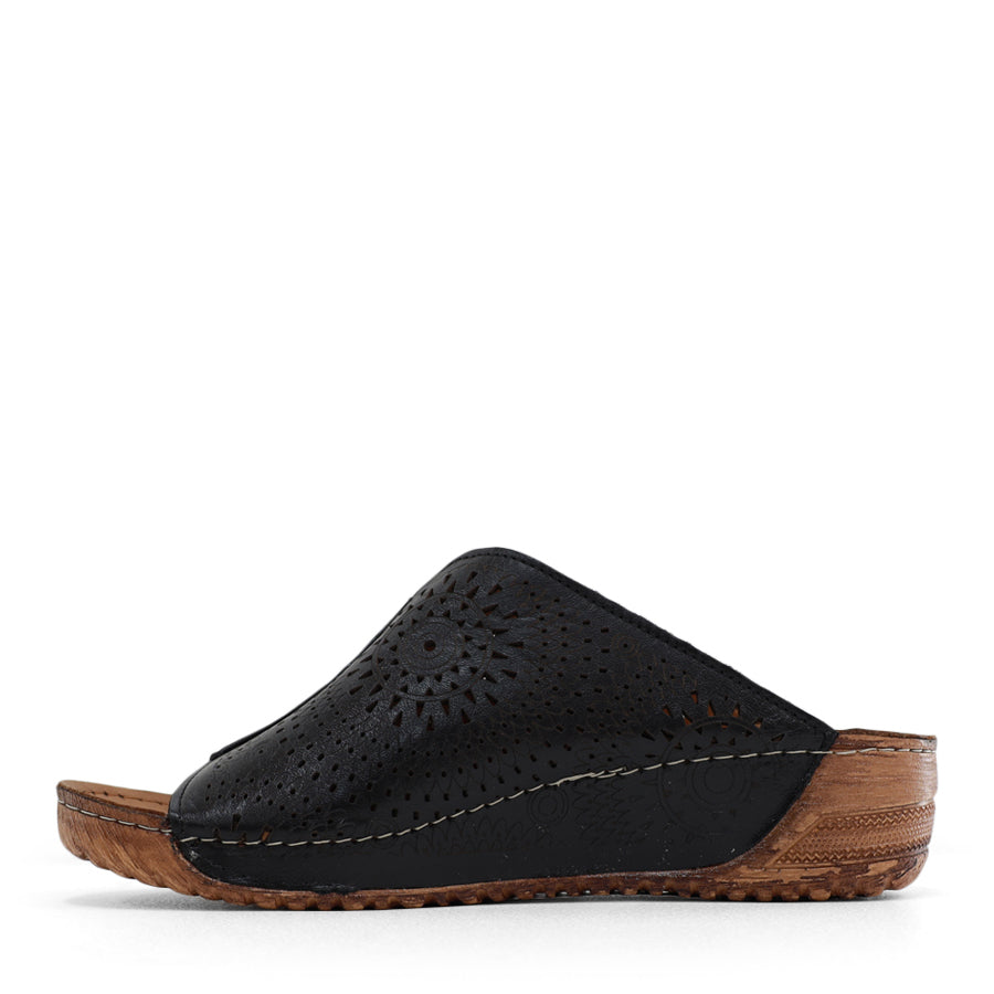 SIDE VIEW OF BLACK SANDAL BOHO MULE STYLE WITH LASER CUT DETAILING