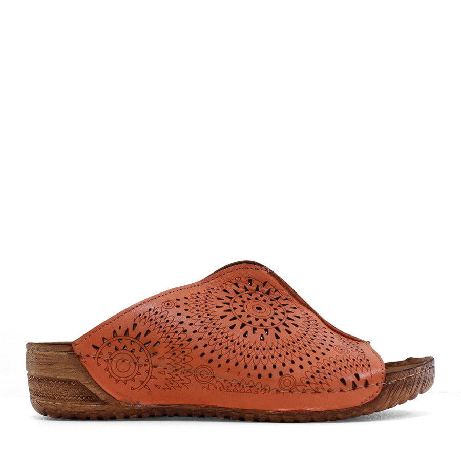 SIDE VIEW OF BLACK SANDAL BOHO MULE STYLE WITH LASER CUT DETAILING 