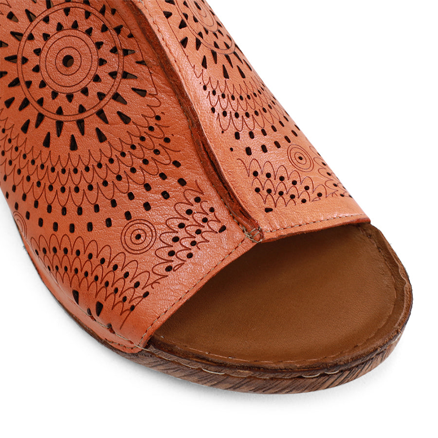 FRONT VIEW OF ORANGE SANDAL BOHO MULE STYLE WITH LASER CUT DETAILING