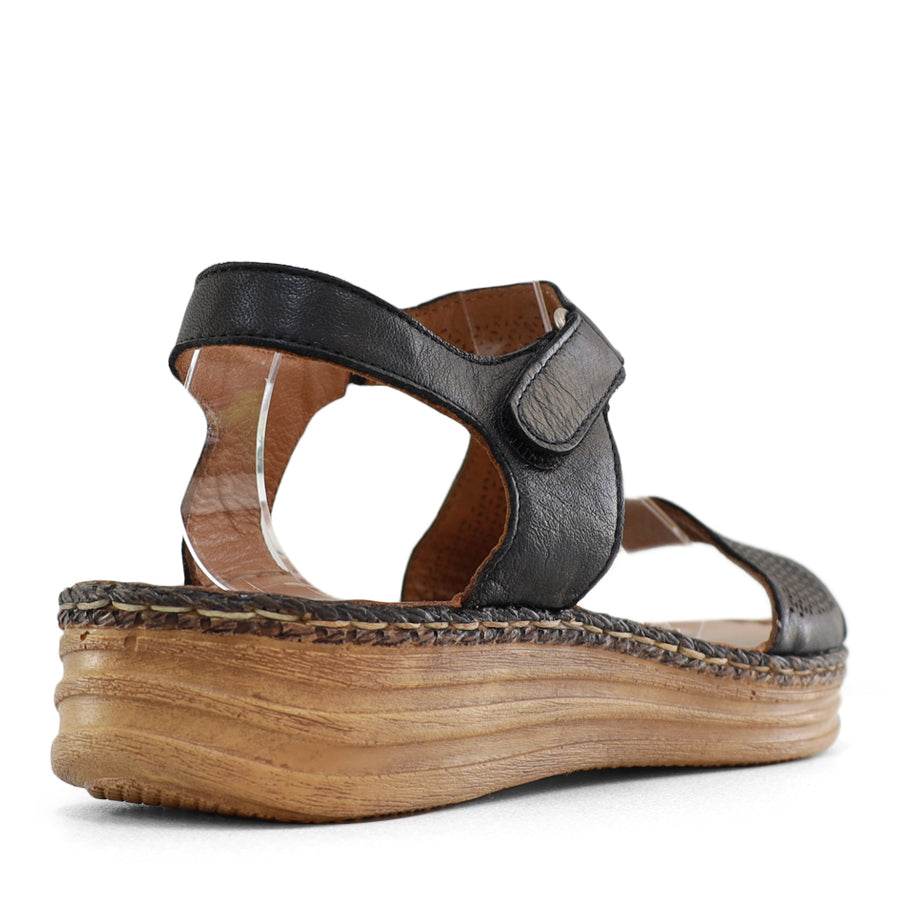 BACK VIEW OF BLACK LEATHER SANDAL WITH STRAP