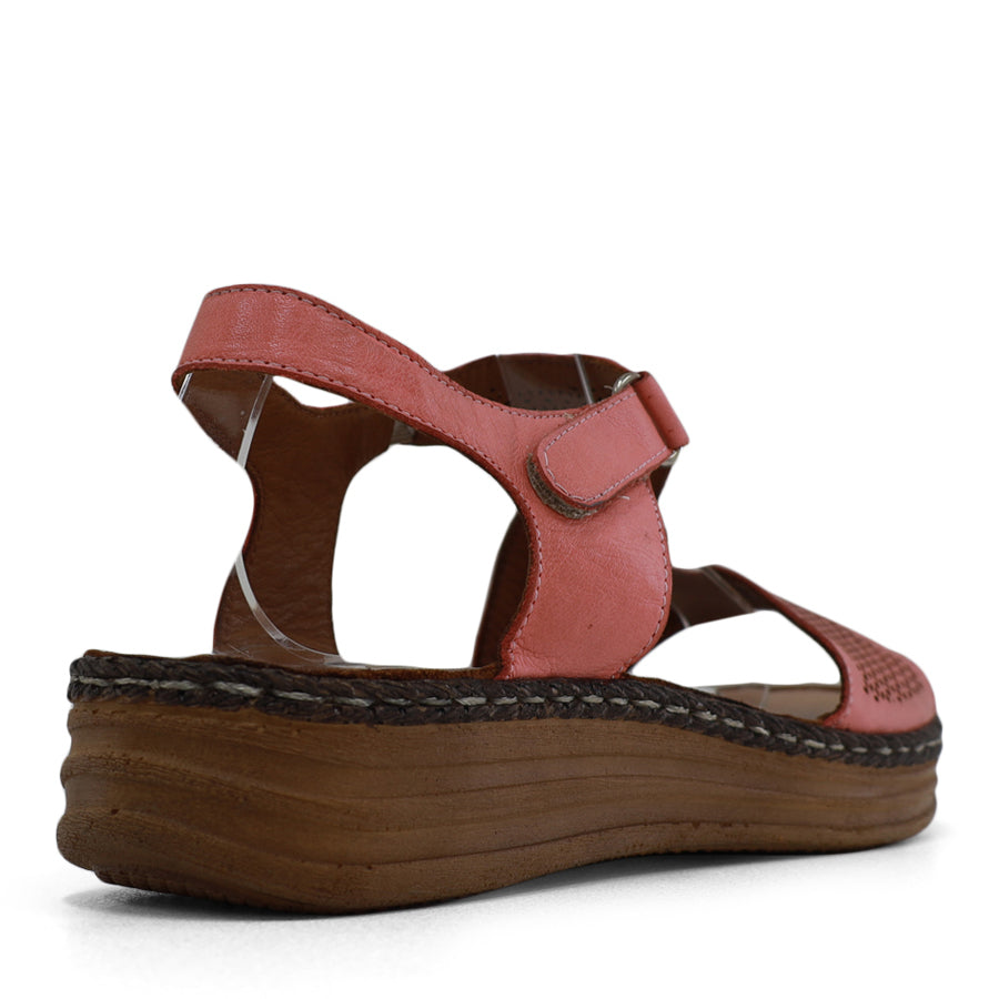 BACK VIEW OF PINK LEATHER SANDAL WITH STRAP