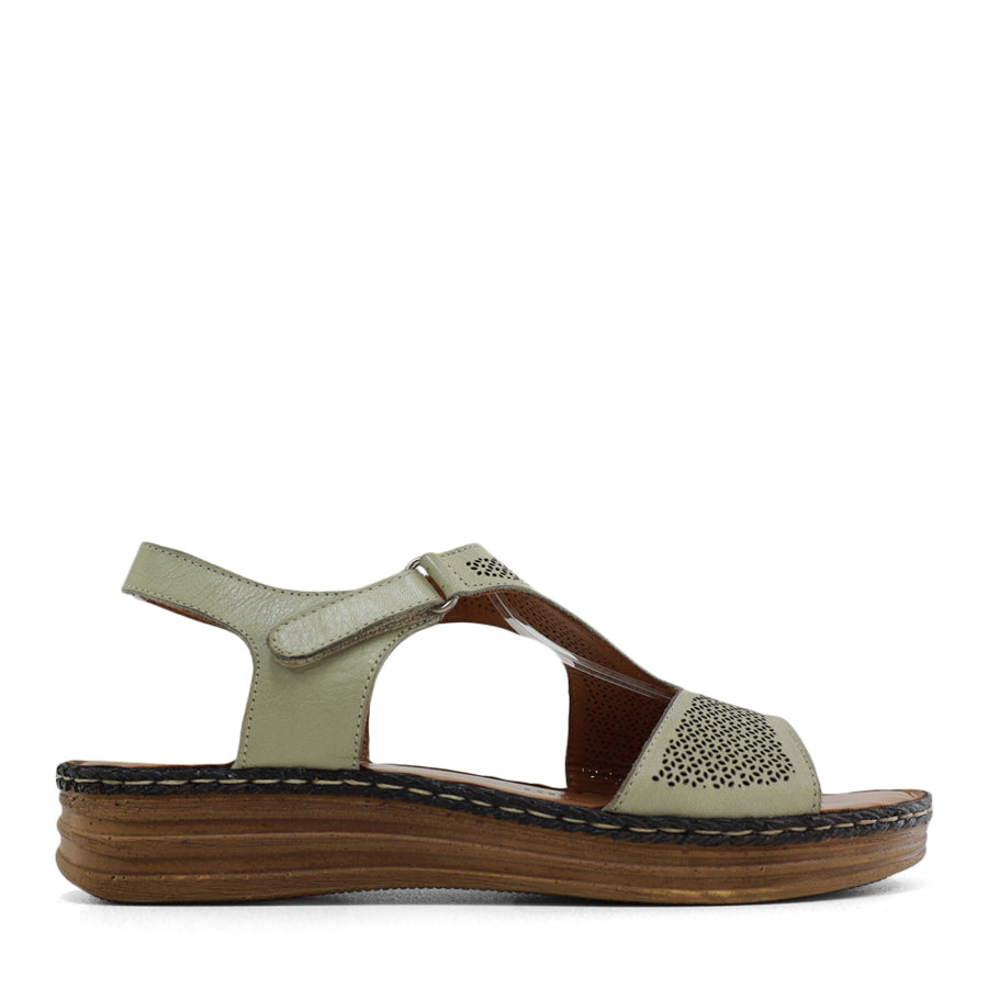  SIDE VIEW OF GREEN LEATHER SANDAL WITH STRAP